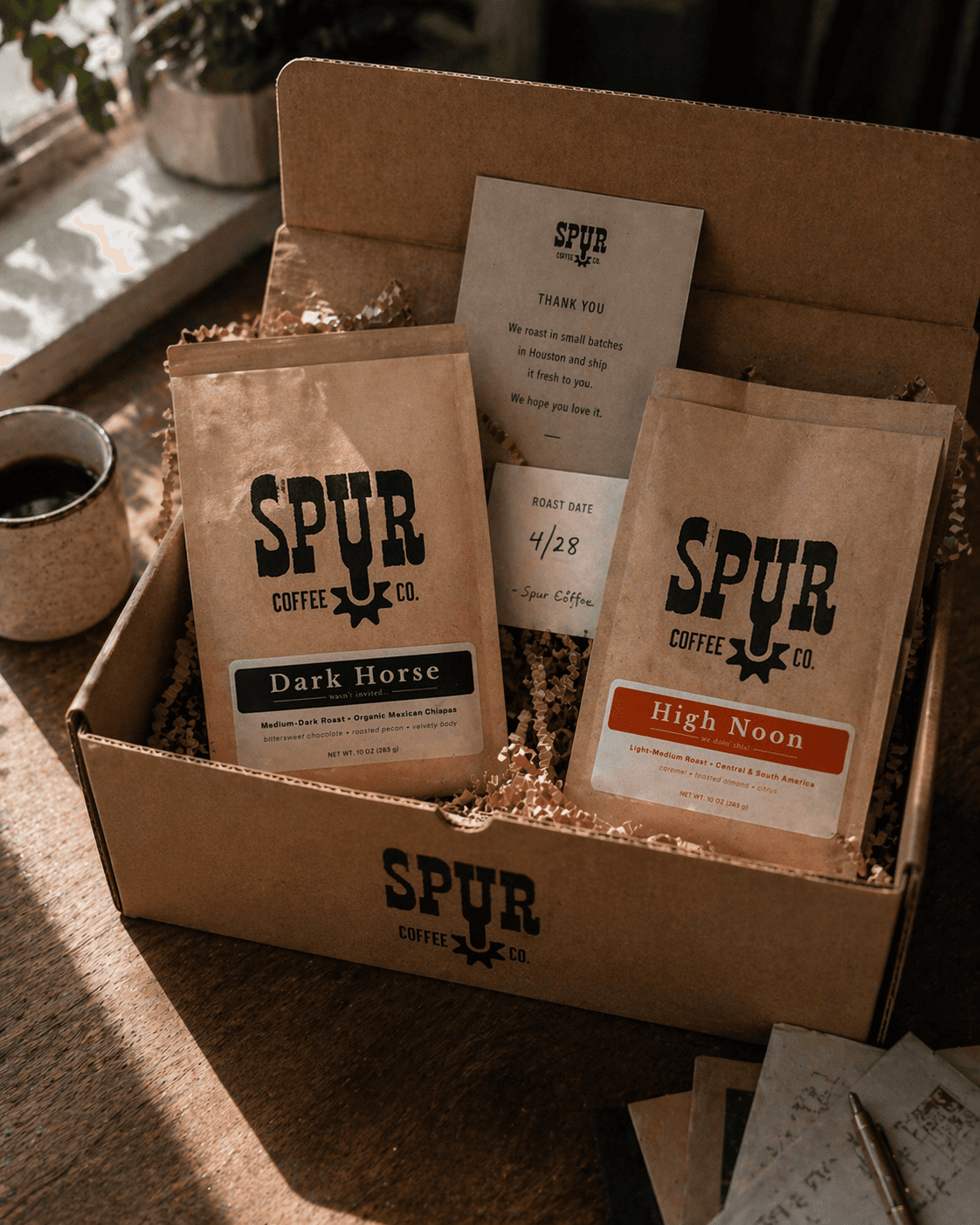 Spur Coffee subscription box with Dark Horse and High Noon bags
